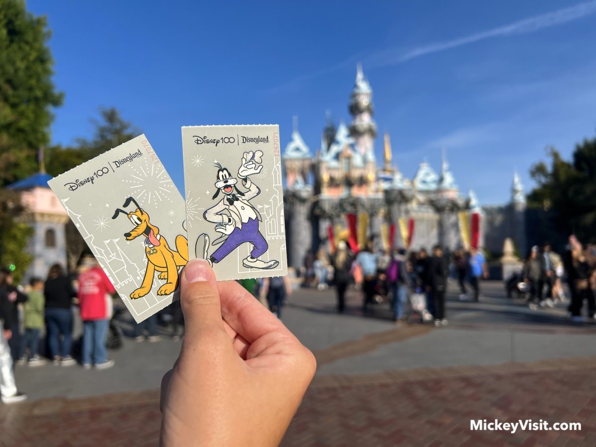 disneyland tickets in front of sleeping beauty castle